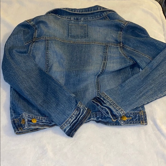 It’s a light blue denim jacket. - Picture 3 of 3